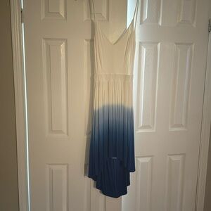 I’m selling a new dress. The brand of the dress is “Bebe”. 
Size XS.